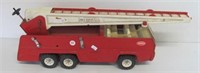 Vintage Tonka metal fire truck with ladder. Note: