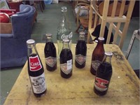 7 Coke Bottles