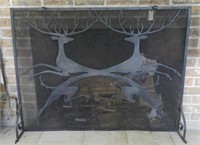 Wrought iron fire screen, pair of jumping deer