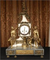Antique Louis XVI style mantel clock, flanked by a pair of  bronze figures and cherub, white marble, dial signed Martinot