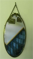 Antique hanging oval mirror with beveled glass