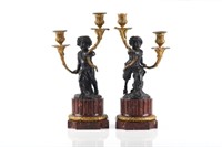 PAIR OF TWO TONE FIGURAL BRONZE CANDELABRA