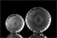 GRADUATED PAIR OF ENGLISH FOOTED SILVER SALVERS