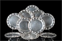 TEN MEXICAN SILVER CHARGER PLATES