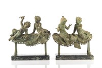 PAIR OF PATINATED BRONZE PUTTI FRAGMENTS
