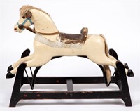 AMERICAN CARVED AND PAINTED ROCKING HORSE, with