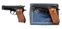 2 Smith & Wesson Auto Pistols.