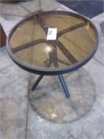 Small round metal glass top table