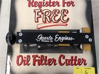 Gaerte Advertising sign with oil filter cutter