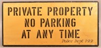 Vintage wood and masonite stenciled sign.