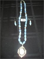 Black onyx pendant with rainbow moonstone beads -