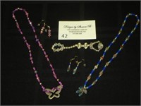Two necklaces and earring sets and Christmas ornam