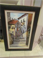 Framed village painting