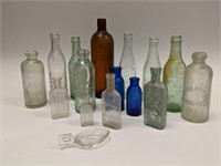 Lot of Antique Embossed Glass Bottles