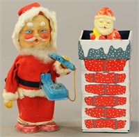 TWO JAPANESE WIND-UP SANTA TOYS