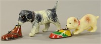 TWO MECHANICAL CELLULOID DOGS WITH SHOES