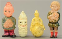 FOUR STANDING CELLULOID FIGURES