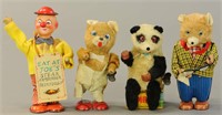 FOUR WIND-UP FIGURAL TOYS