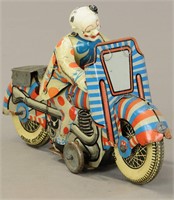 METTOY 1ST PRIZE CLOWN RIDING MOTORCYCLE
