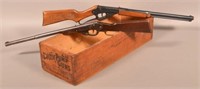 Two Daisy BB Guns with Wooden Advertising Crate.