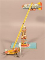 Unique Art Sky Ranger Tin Lithograph Wind-up Toy.