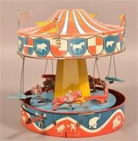 Wolverine Tin Lithograph Spring Lever Carousel.
