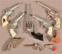 Eight Vintage Hubley Cap Pistols.