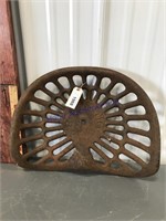 Deering cast iron seat (18"), has chip