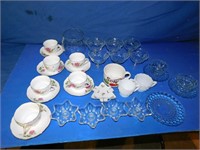 Six cups & saucers, candle stick holders, etc