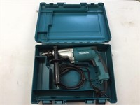 Makita !/2" Electric Hammer Drill With Case