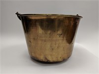 Antique brass bucket with iron handle