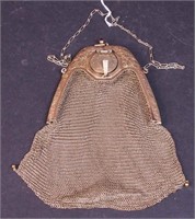 An Art Deco gold-filled mesh purse with mirror and