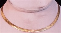 A yellow gold necklace marked 14K Italy