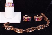 A yellow gold bracelet, matching earrings