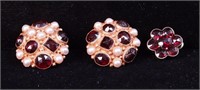 A pair of handmade gold earrings, marked 14K,