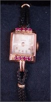 A woman's yellow gold 14K wristwatch with