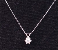 A 14K white gold necklace with a .25-carat