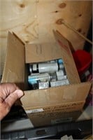 Box Of Various Spray Cans