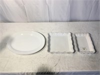 3 white ceramic trays