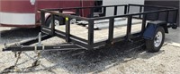 6x12 black trailer with ramps, gate and lights.