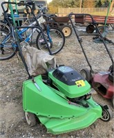 Lawn-Boy self propelled push mower and bag.