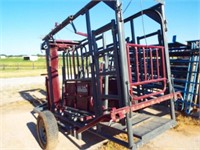 W&W portable cattle chute with palpating cage