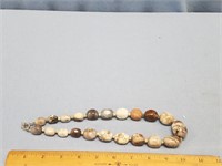 Graduated stone bead necklace that is 19" long