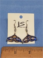 Pair of whale tail shaped dangle earrings