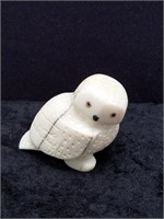 Ivory carving of an owl with fossilized inset eyes