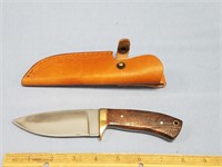 8.5" Long skinning knife with brass hilt and synth