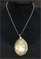 Abalone shell pendant on a sterling silver chain