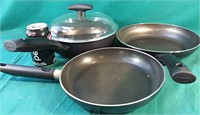 2 megaware frying pans and 1 meyer milano frying