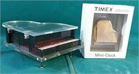 Vintage piano music box and vintage Timex piano