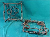 Two vintage animal leg traps